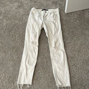 Express high waisted white jeggings, distressed, size 6. Raw hem, super stretchy